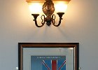 Poster and lamp in the Belmond British Pullman Orient Express waiting room at Folkestone